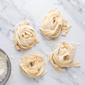 Sourdough pasta pieces on counter ready to dry.
