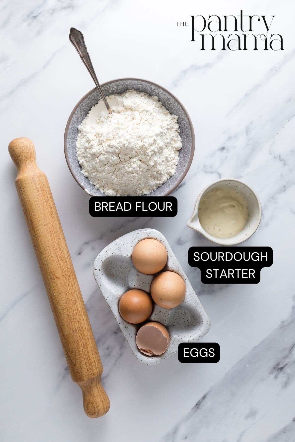 Labeled ingredients on counter to make sourdough pasta.
