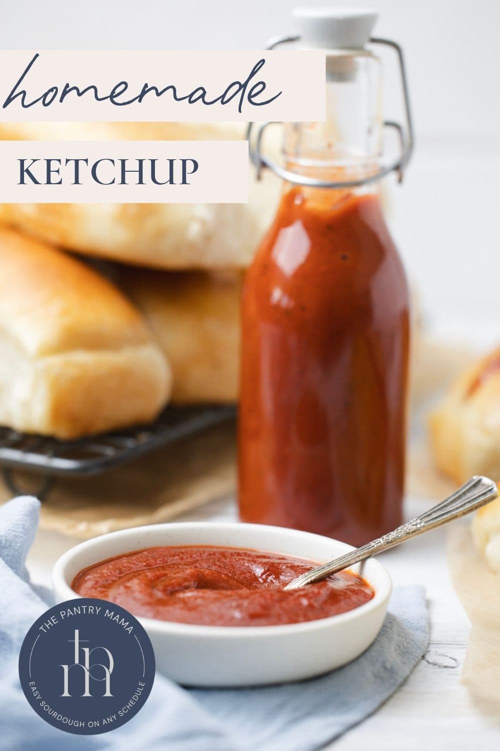 A bowl of homemade ketchup ready to be spooned on hotdogs with text overlay for a Pinterest Pin image.