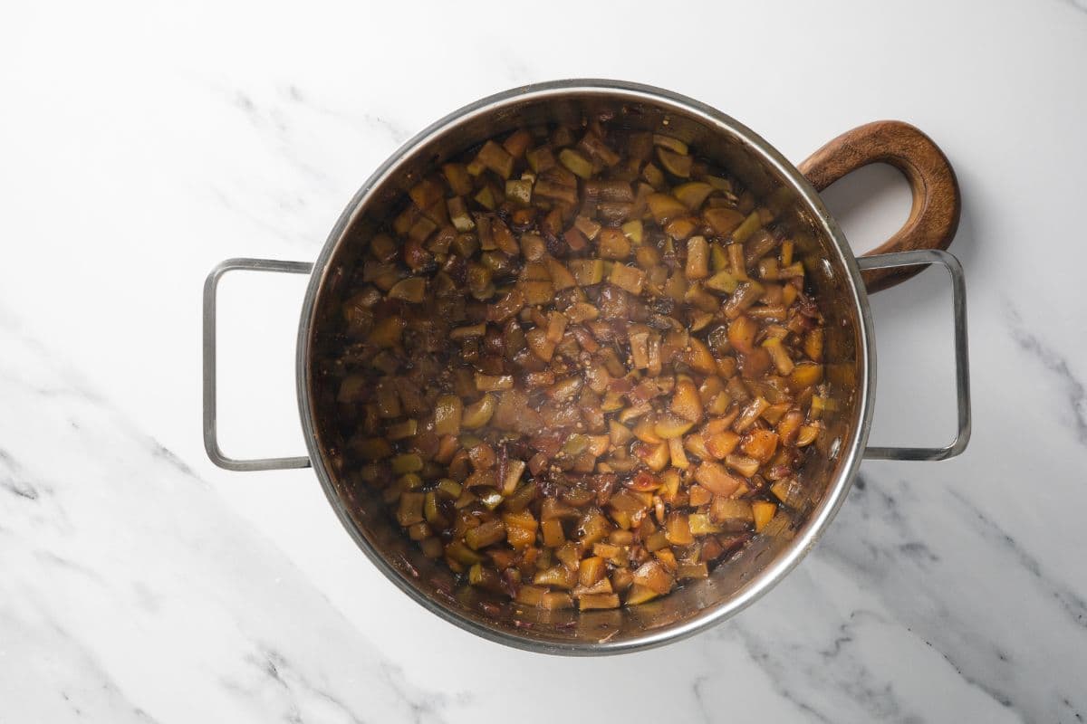 A pot of peach chutney cooking.
