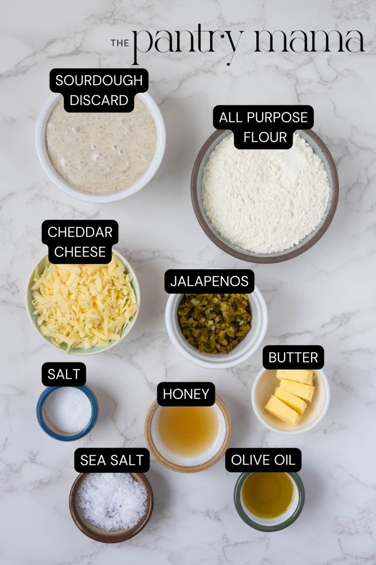 Labeled ingredients on the counter to make sourdough jalapeño cheddar crackers.
