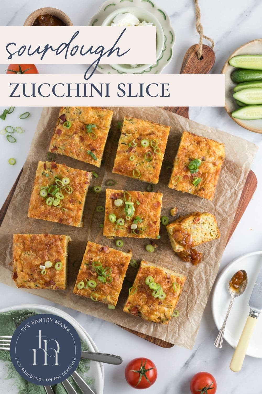 A photo of a sourdough zucchini slice cut into pieces on a cutting board with text overlay for a Pinterest Pin image.