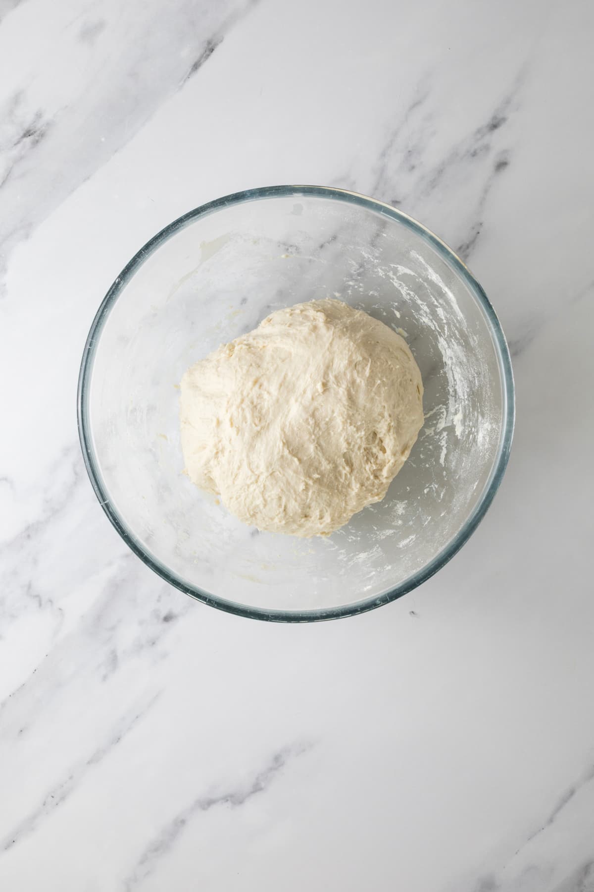 Overnight sourdough bread dough in a mixing bowl.