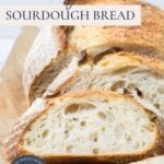 Same day sourdough bread sliced on a wooden board with text overlay showing an easy same day sourdough recipe.