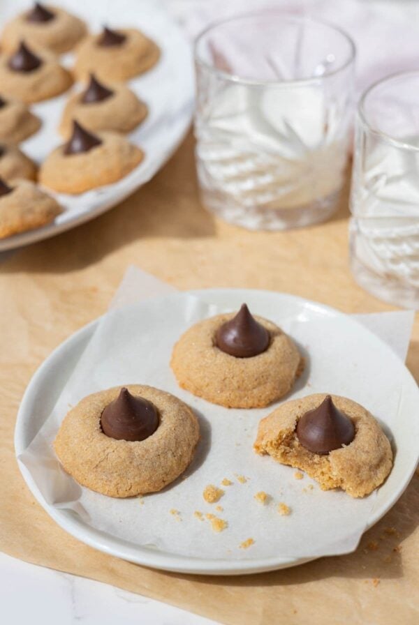 Soft and chewy sourdough peanut butter blossom cookies topped with milk chocolate kisses.