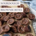 Pinterest pin for sourdough chocolate brownie bites arranged on a cooling rack with text overlay.