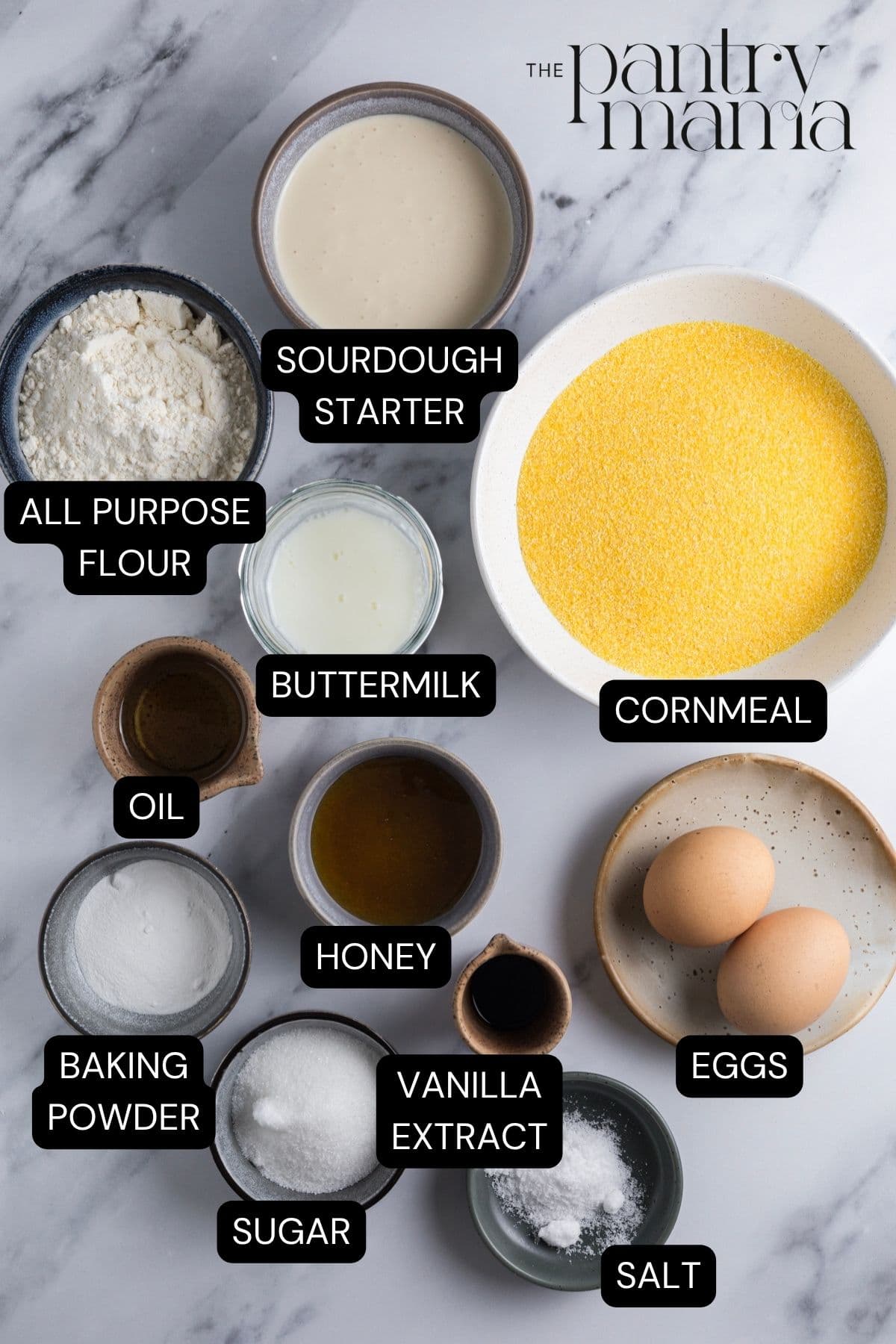 Labeled ingredients to make sourdough cornbread muffins.