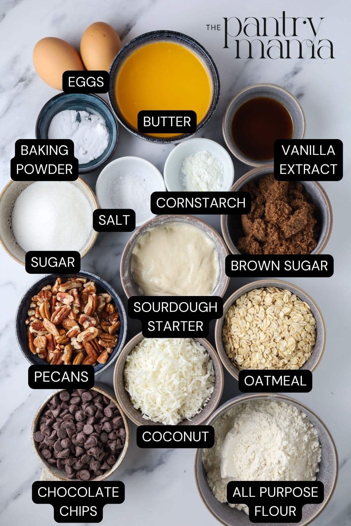 Labeled ingredients to make sourdough cowboy cookies.
