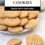Sourdough peanut butter cookies made with sourdough discard stacked on a plate with text overlay.