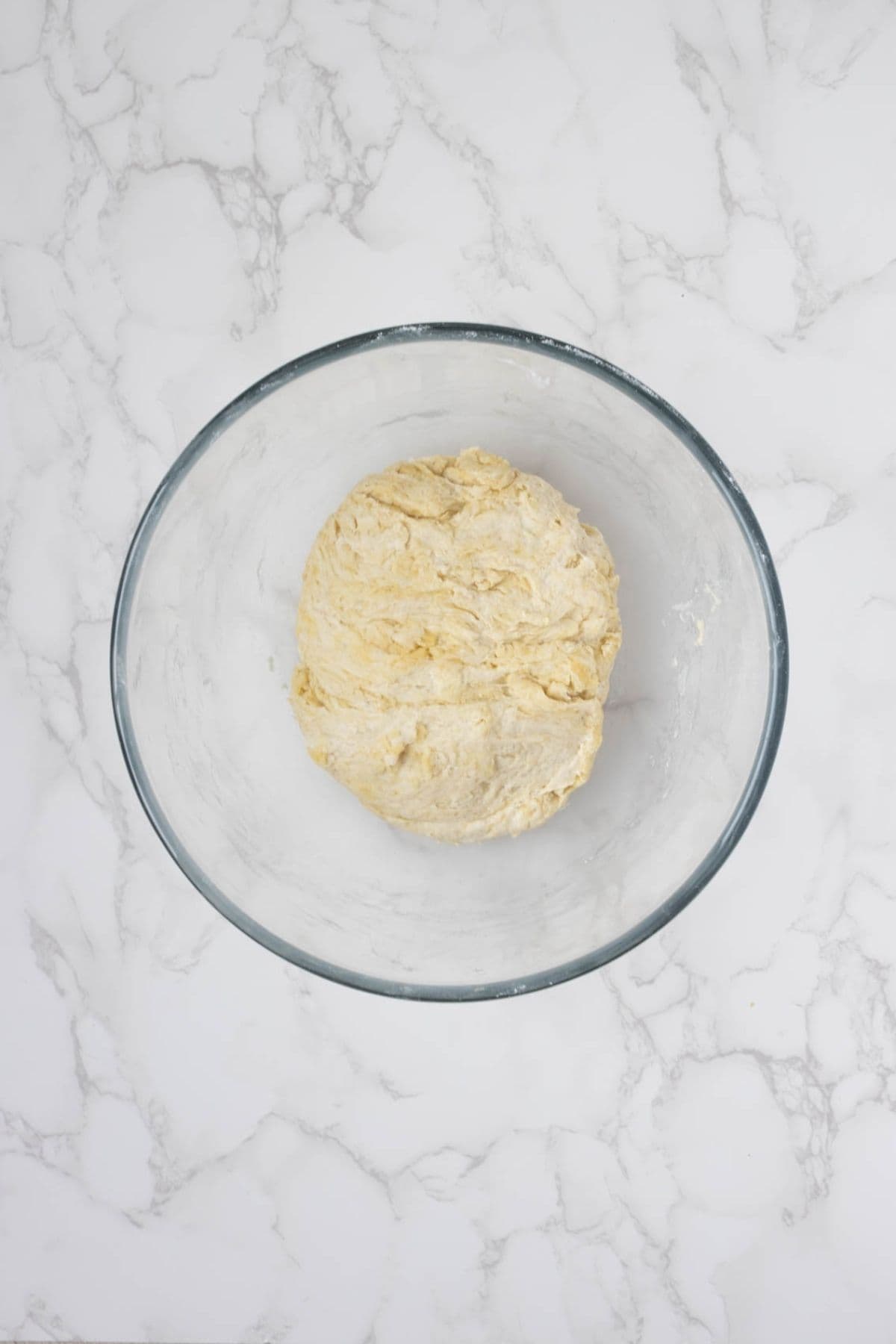Freshly mixed sourdough gozleme dough resting before portioning and shaping.