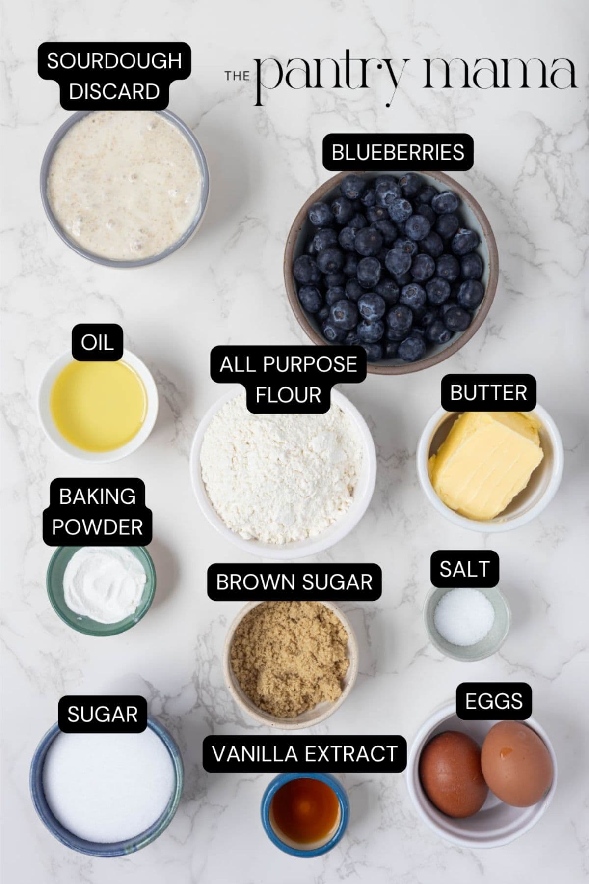 Labeled ingredients to make sourdough blueberry muffins with streusel topping.