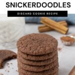 Pinterest pin featuring sourdough chocolate snickerdoodle discard cookies featuring a stack of cookies on parchment paper with cinnamon and cinnamon sticks in the background.
