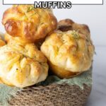 Pinterest pin for homemade sourdough focaccia muffins with rosemary and olive oil in a serving basket.