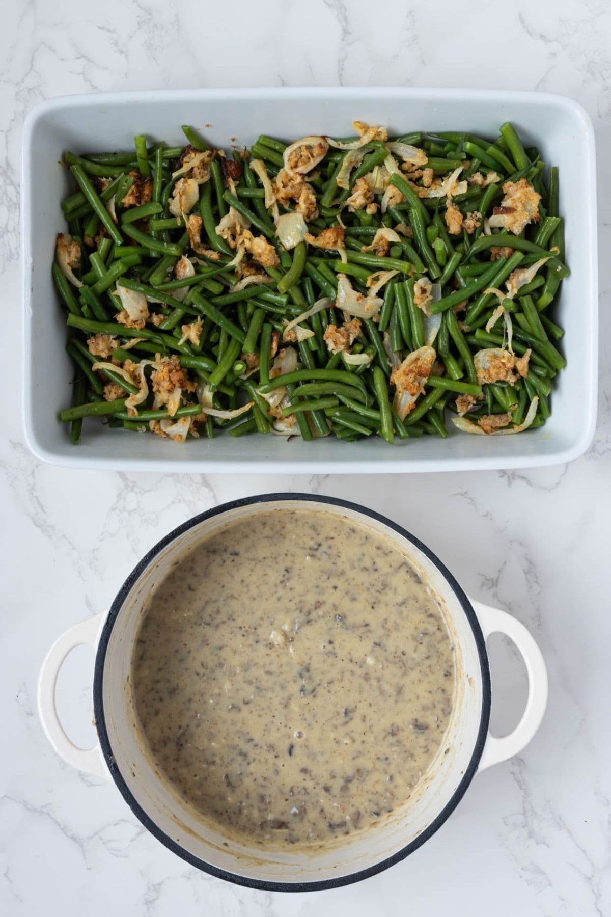 Blanched green beans and homemade mushroom sauce ready to assemble into sourdough green bean casserole.