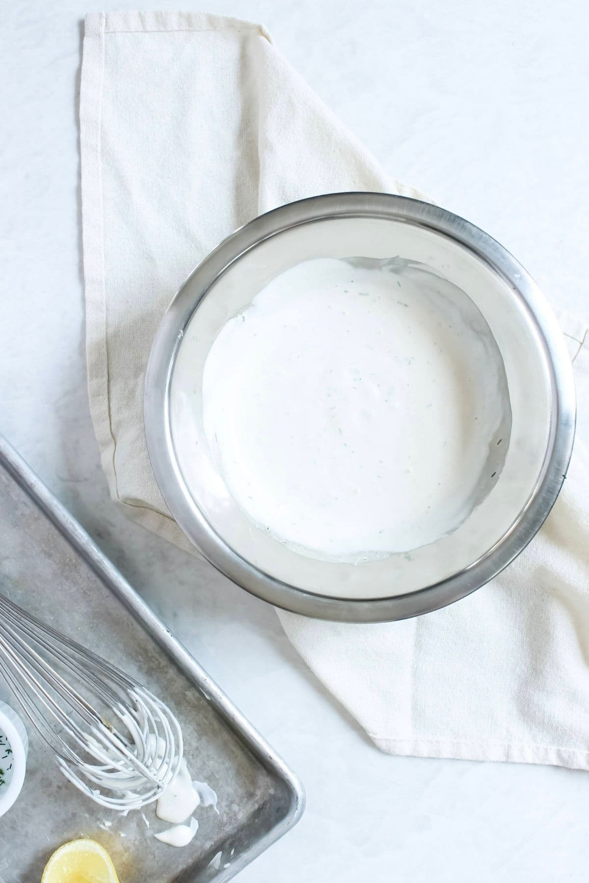 Homemade ranch dressing mixed together in a bowl until smooth and creamy.