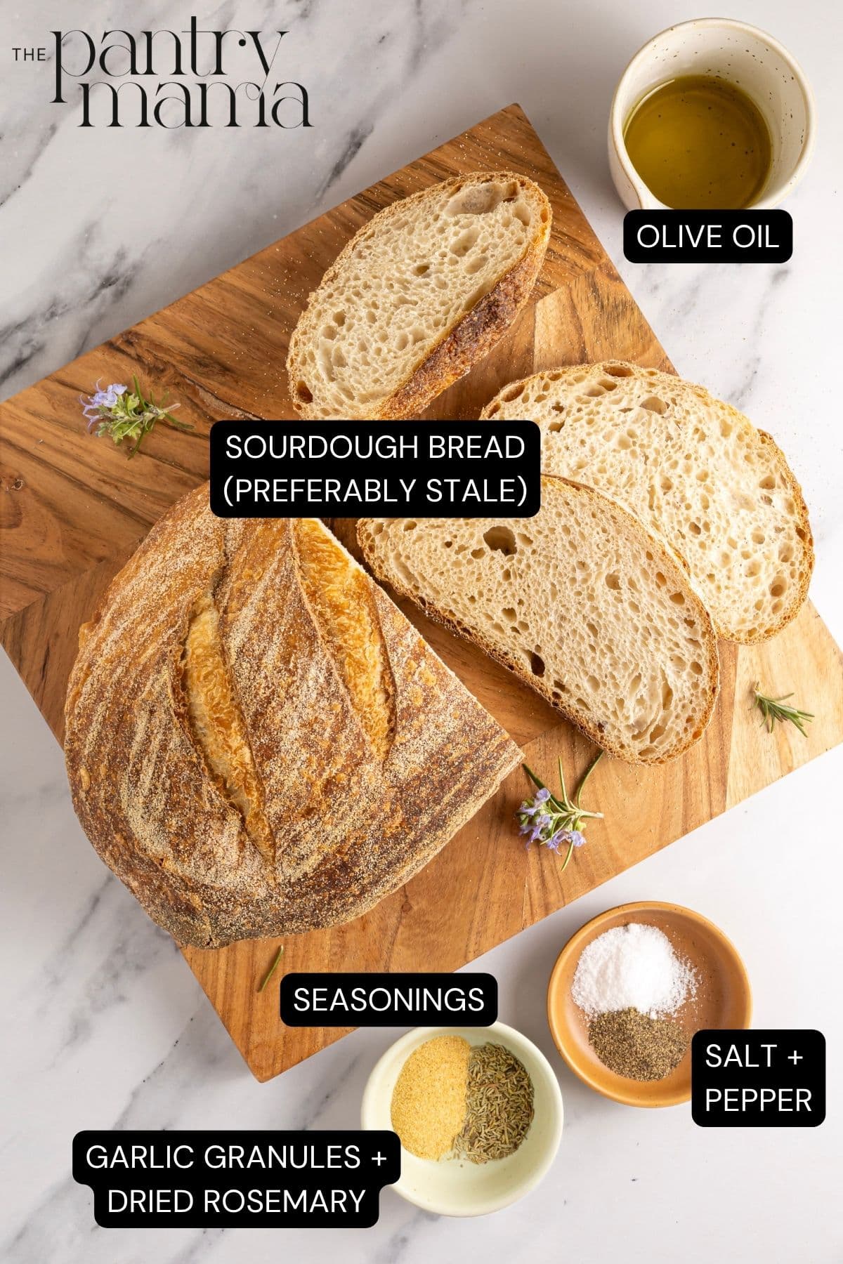 A flat lay image of the ingredients needed to make a batch of sourdough croutons.