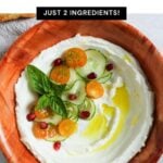 Close up of homemade labneh in a bowl for serving with text overlay for a Pinterest Pin image.