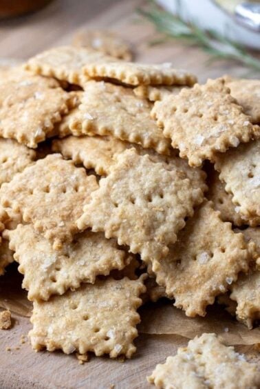 A pile of sourdough discard crackers made with whole wheat flour.