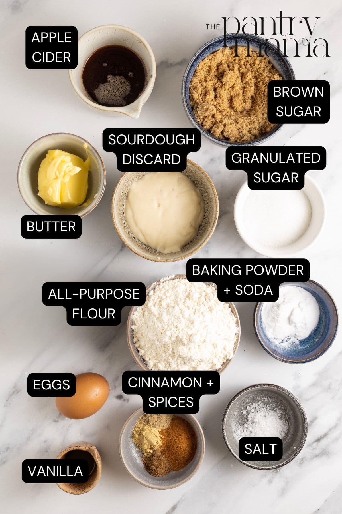 Flat lay of ingredinets necessary to make sourdough apple cider donuts.